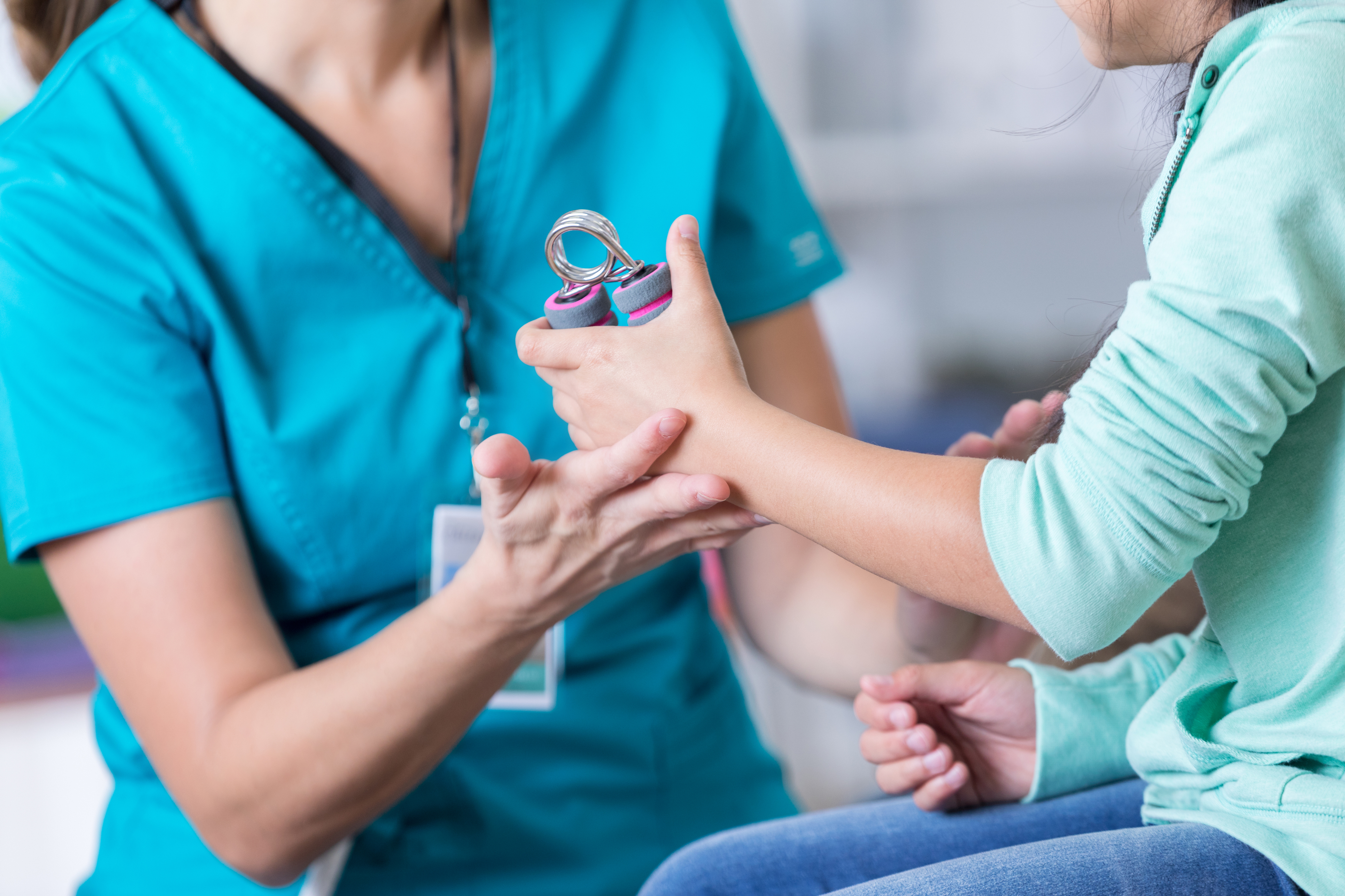 Woman getting hand therapy 